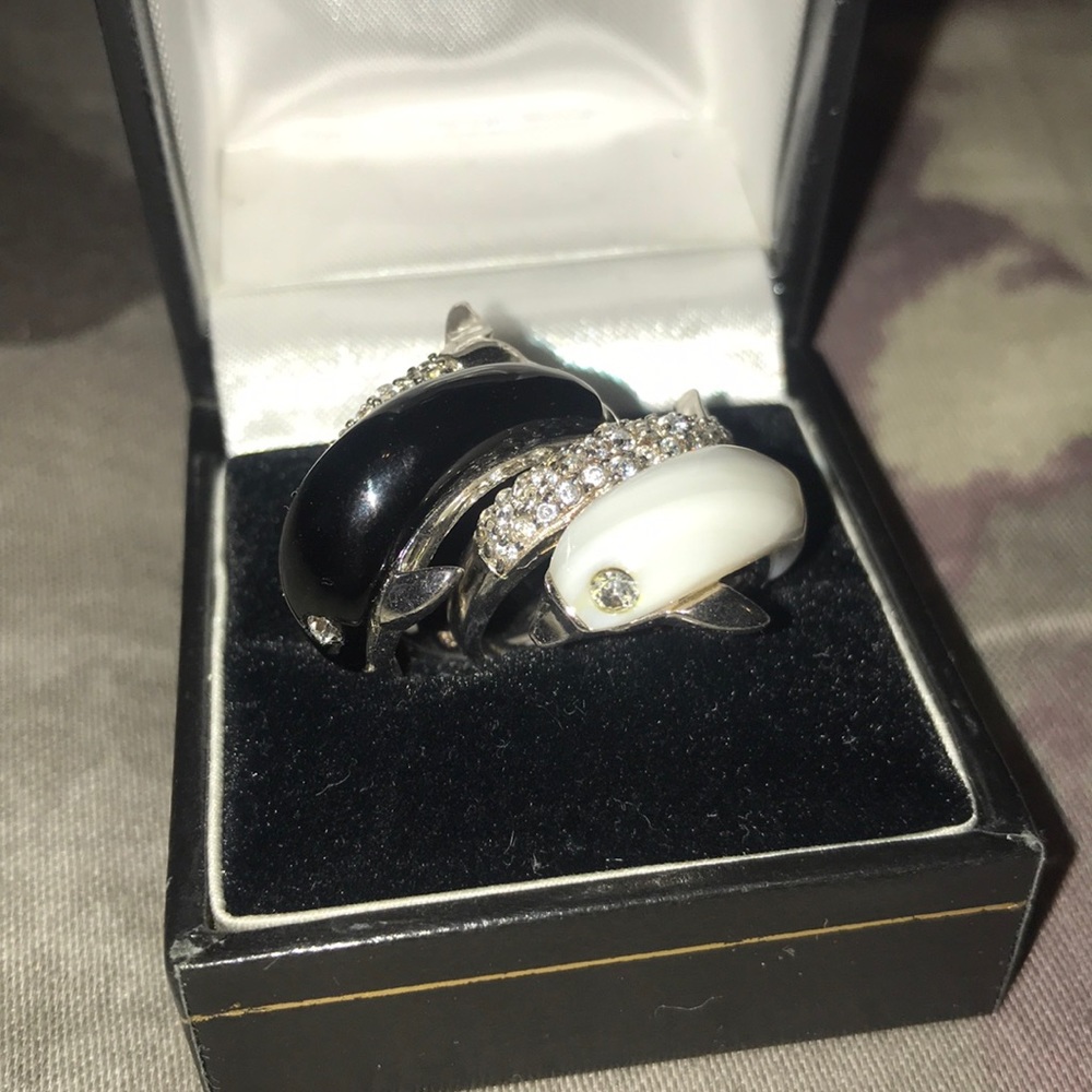 Two dolphin rings